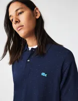 Playera tipo polo Lacoste estampado jaspeado para hombre