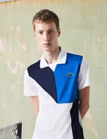 Playera tipo polo Lacoste estampado bloques de color para hombre