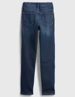 Jeans slim lavado obscuro para niña
