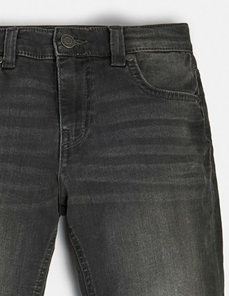 Jeans slim Guess ho22 lavado deslavado para niño