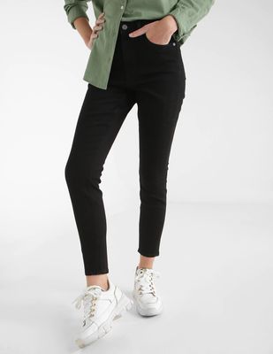 Jeans skinny obscuro corte cintura alta para mujer