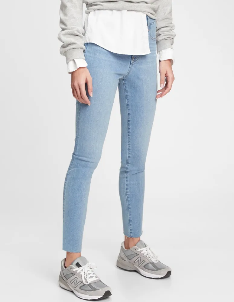 Jeans skinny lavado claro corte cintura para mujer