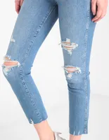 Jeans slim lavado destruido corte cintura para mujer