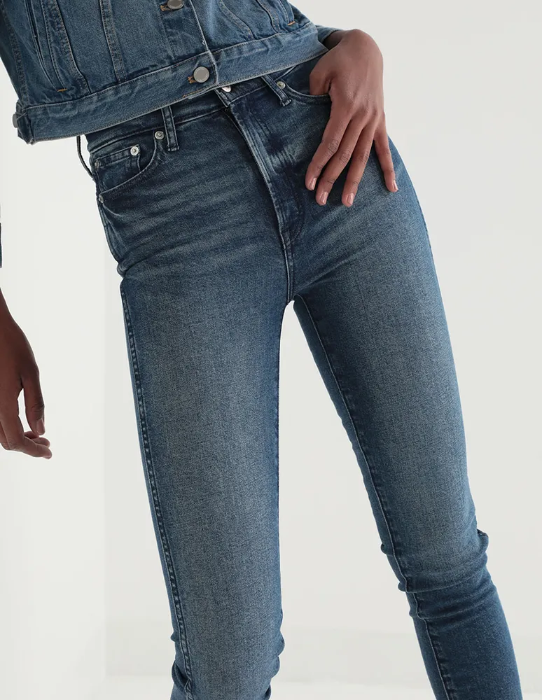 Jeans slim deslavado corte cintura para mujer