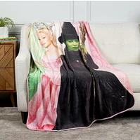 Wicked : Couverture en peluche Elphaba et Glinda 