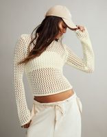 Pull ajouré col montant