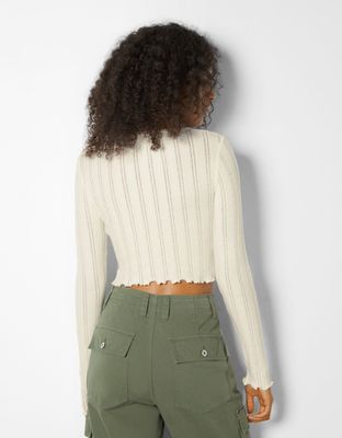 Top cropped manches longues curly