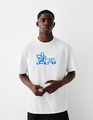 T-shirt de manga curta com estampado graffiti