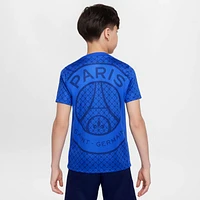 Paris Saint-Germain Academy Pro Home Big Kids' Nike Dri-FIT Soccer Pre-Match Short-Sleeve Top