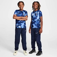 Tottenham Hotspur Academy Pro Big Kids' Nike Dri-FIT Soccer Pre-Match Short-Sleeve Top