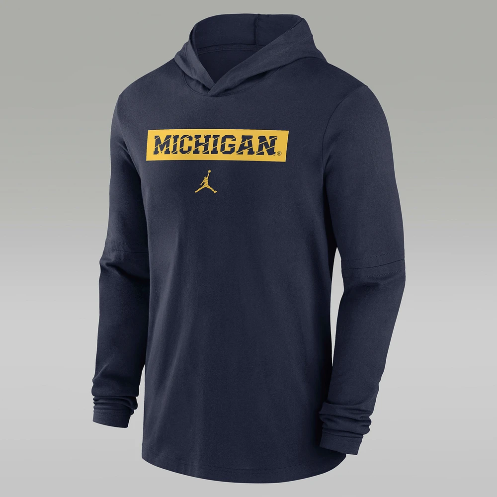 Michigan Wolverines Sideline Men's Jordan Dri-FIT College Long-Sleeve Hooded Top