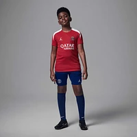 Paris Saint-Germain Strike Fourth Big Kids' Jordan Dri-FIT Soccer Knit Short-Sleeve Top