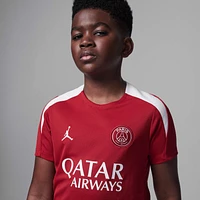 Paris Saint-Germain Strike Fourth Big Kids' Jordan Dri-FIT Soccer Knit Short-Sleeve Top