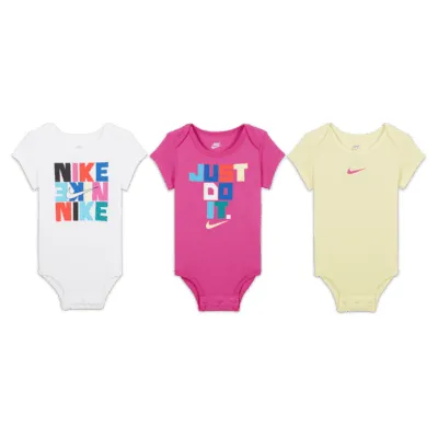 Lot de trois bodys Nike pour bébé (3 - 6 mois). FR