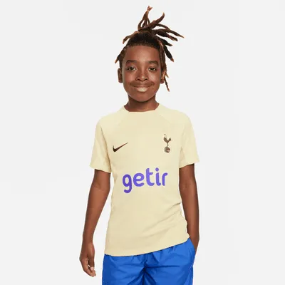 Tottenham Hotspur Academy Pro Older Kids' Nike Dri-FIT Pre-Match Football  Top. Nike LU