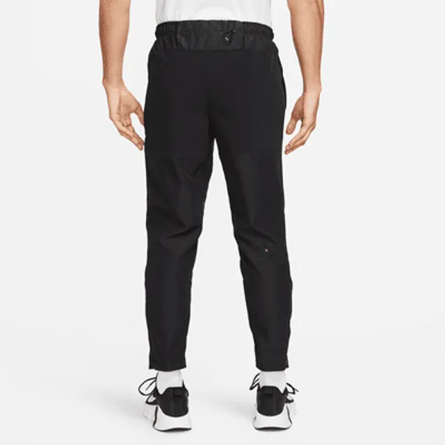 Nike A.P.S. Men's Dri-FIT ADV Woven Versatile Pants.