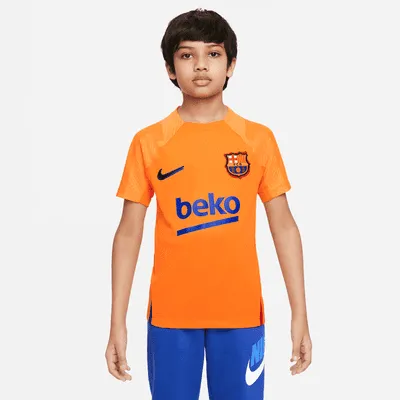 FC Barcelona Strike Big Kids' Nike Dri-FIT Short-Sleeve Soccer Top. Nike.com