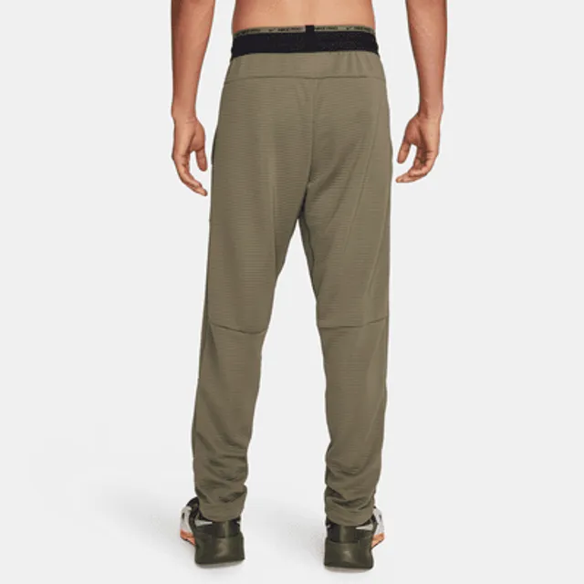 Nike A.P.S. Men's Therma-FIT Versatile Pants.