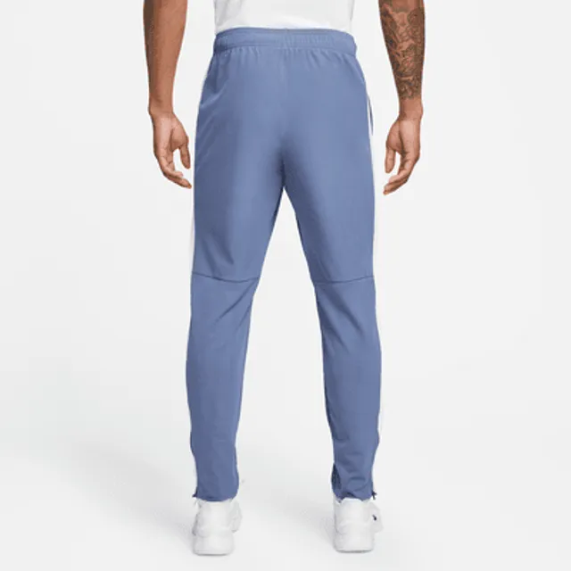 NikeCourt Heritage Men's French Terry Tennis Trousers. Nike AT