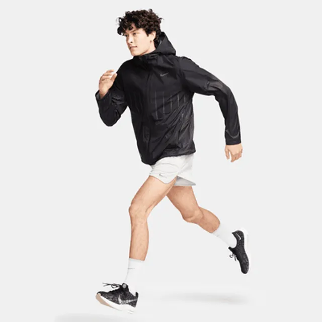 Nike Track Club Men's Storm-FIT Running Jacket.