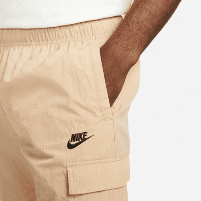 Nike Sportswear Repeat Men's Lightweight Woven Trousers. UK