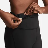 Nike Women's Tight Mid-Rise Ribbed-Panel Running Shorts with Pockets. Nike.com