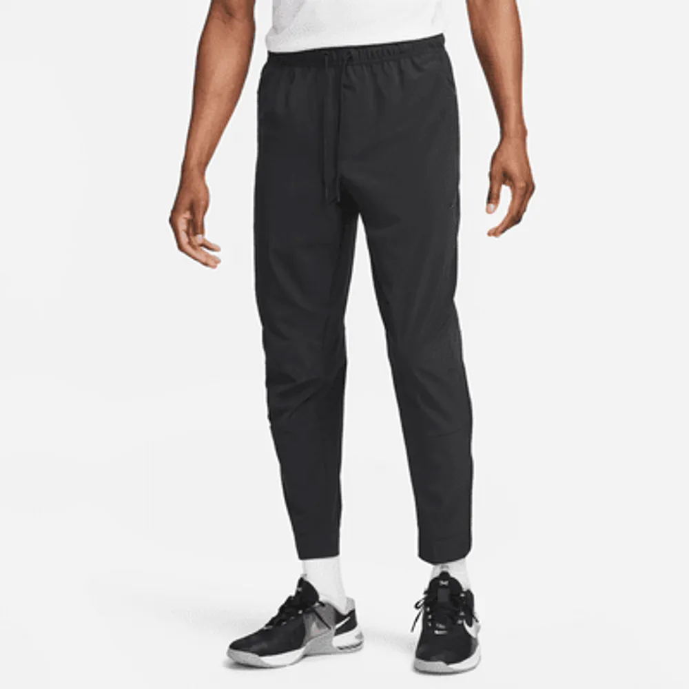 Nike Unlimited Men's Dri-FIT Zippered Cuff Versatile Pants.