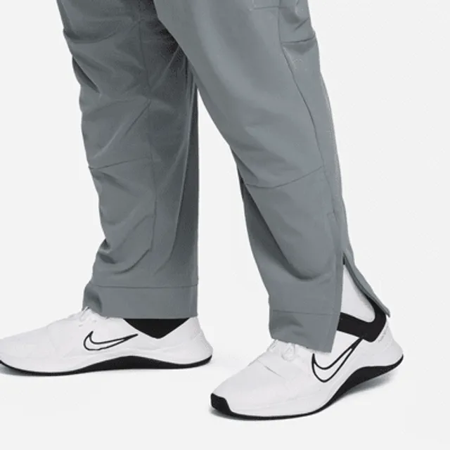 Nike Unlimited Men's Dri-FIT Tapered Leg Versatile Pants.