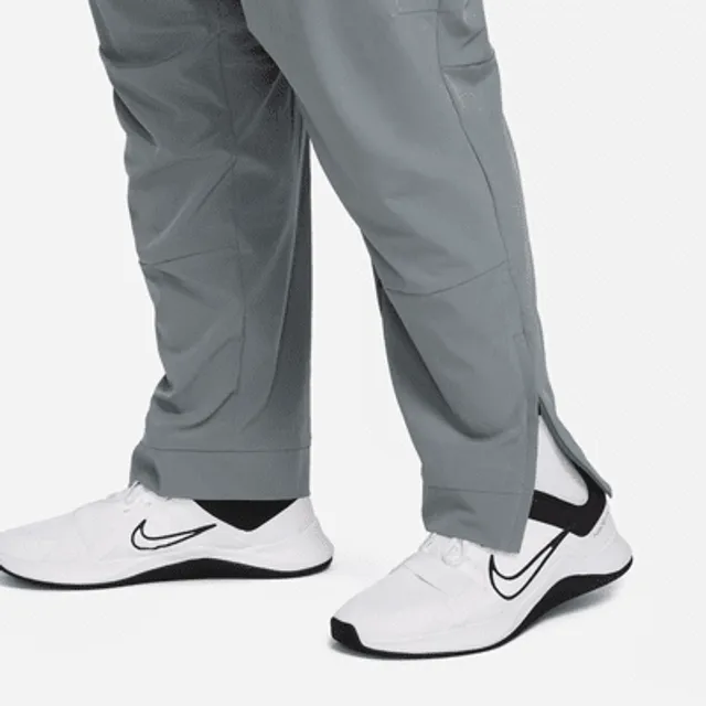 Nike Unlimited Men's Water-Repellent Zippered Cuff Versatile Pants. Nike.com