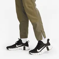 Nike A.P.S. Men's Dri-FIT ADV Woven Versatile Pants. Nike.com