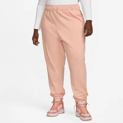Nike Women's Sportswear Essential Fleece Pants (plus Size) In Pink