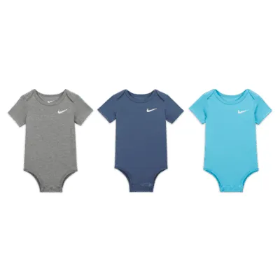 Lot de trois bodys Swoosh Nike pour bébé (3 - 6 mois). FR