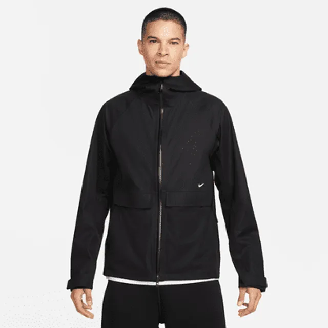 Nike Track Club Men's Storm-FIT Running Jacket.