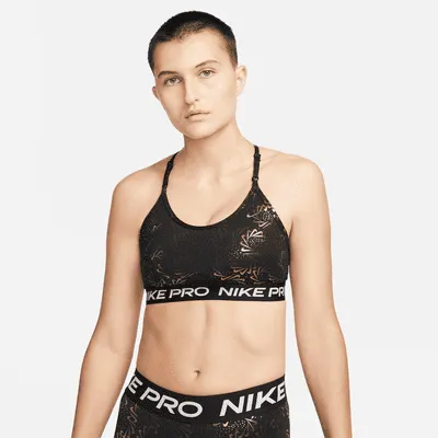 Brassière de sport scintillante à maintien léger et bretelles Nike Pro Indy pour femme. FR
