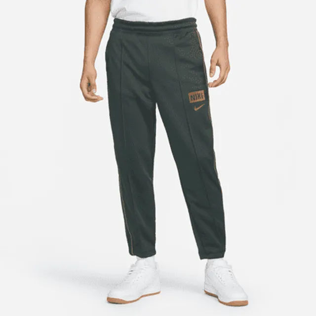 Nike Sportswear Repeat Men's Lightweight Woven Trousers. UK