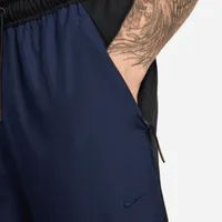 Nike Unlimited Men's Water-Repellent Zippered Cuff Versatile Pants. Nike.com
