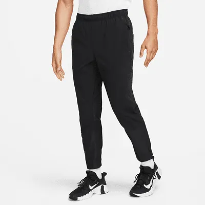 Nike A.P.S. Men's Dri-FIT ADV Woven Versatile Pants. Nike.com