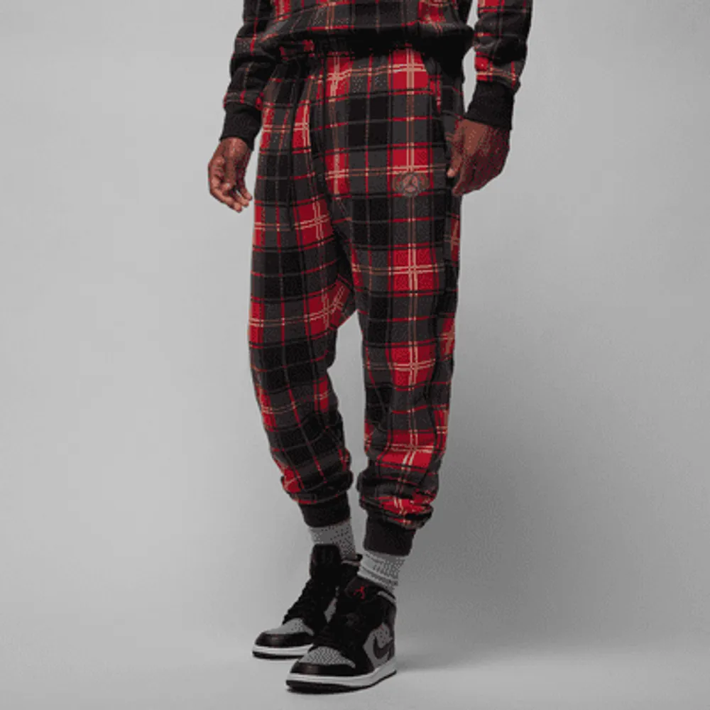 Nike Jordan Essential Holiday Men's Fleece Pants. Nike.com