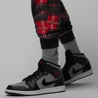 Nike Jordan Essential Holiday Men's Fleece Pants. Nike.com