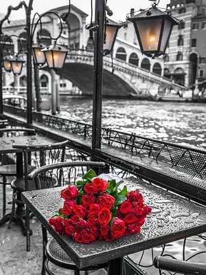 Bunch of red roses on street cafe table-Rialto Bridge-Venice-Italy by Assaf Frank - Item # VARPDXAF20130409345C01