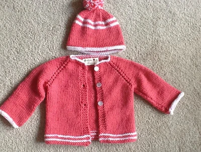 An infant sweater and hat