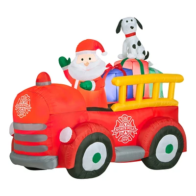 National Tree Company 6 ft. Inflatable Santa in Vintage Firetruck