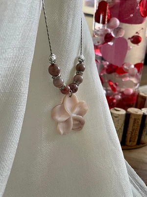 Mother of pearl flower pendant with sunstone beads in shades of pink on silver chain with lobster clasp, Length 16”