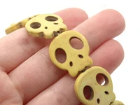 18 21mm Yellow Dyed Synthetic Turquoise Flat Skull Stone Beads