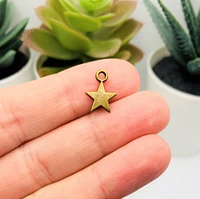 4, 20 or 50 Pieces: Small Bronze Star Charms