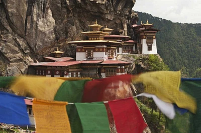 Bhutan Prayer flags hang near Taktshang by Dennis Kirkland - Item # VARPDXAS04BJA0076