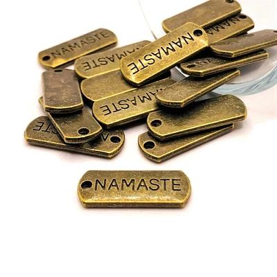 4, 20 or 50 Pieces: Bronze Namaste Word Tag Charms