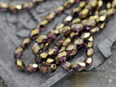 *20* 5x7mm Bronze Lustered Violet Fire Polished Faceted Oval Beads