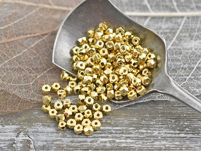 6g 2x3mm 24kt Gold Plated Faceted Micro Spacer Beads