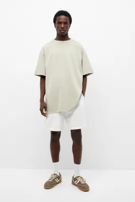 Bermuda jogger à pinces en tissu piqué